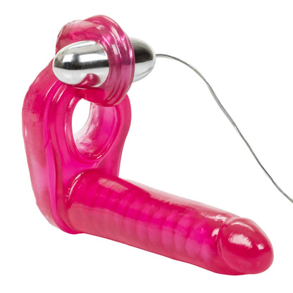 Close-up of a vibrating cock ring from california exotic, with double dildos on either side.