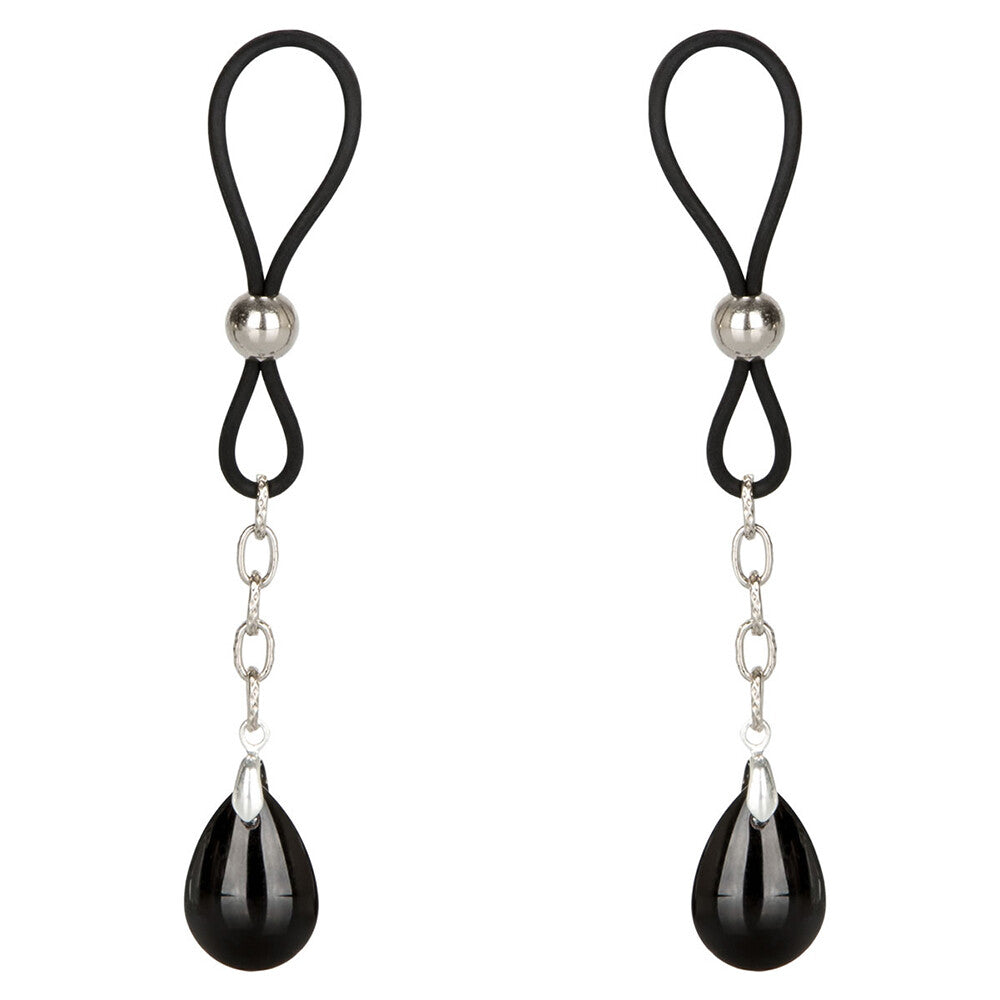 Close-up of non-piercing onyx nipple jewellery for sensual fun, in a polished finish.