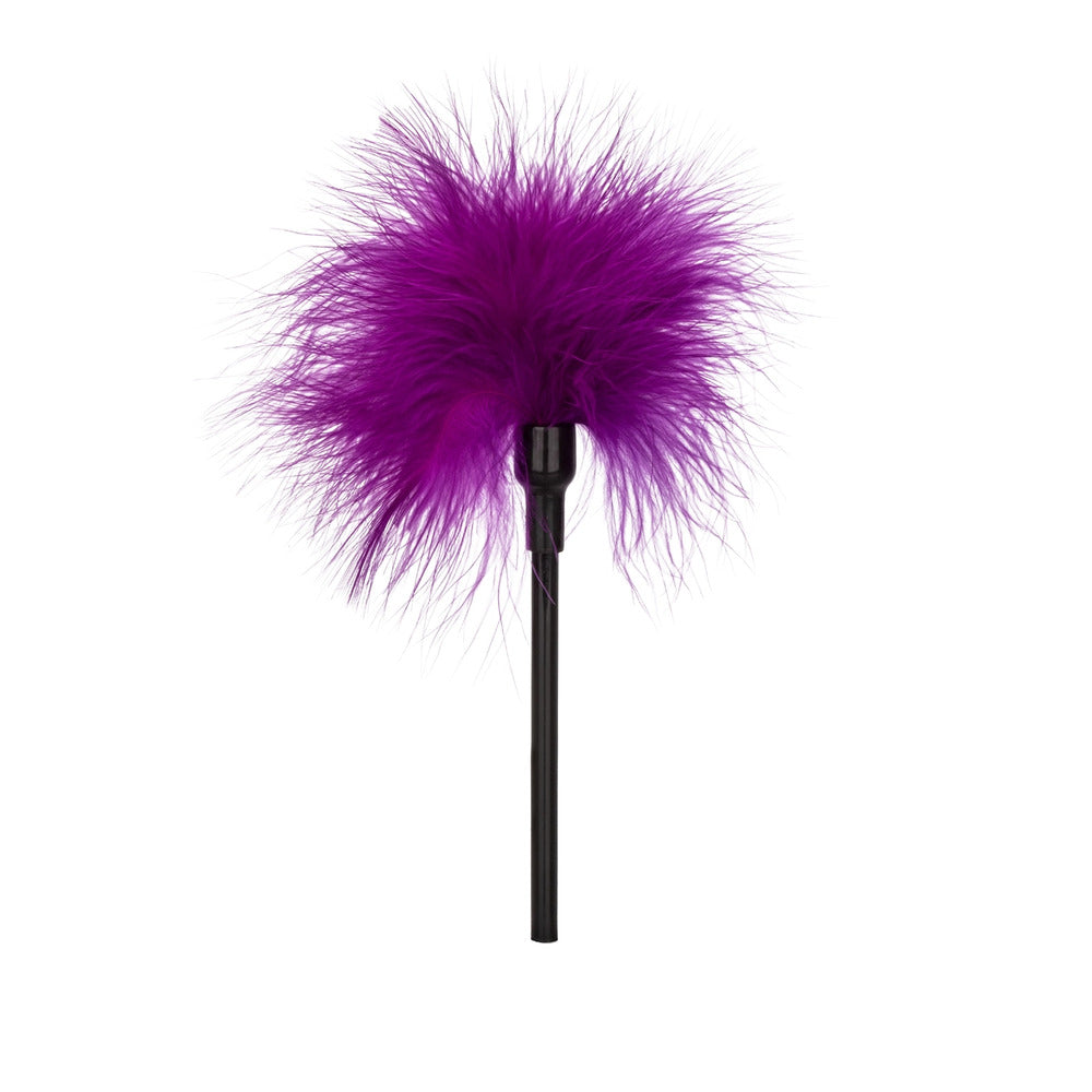 California Exotic playful tickler novelty, a textured vibrator with a smooth, ergonomic handle.