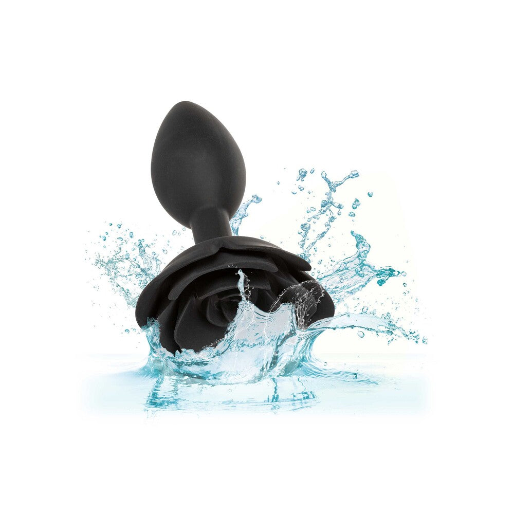 Large, rose-shaped anal plug in a deep crimson colour, smooth finish, for pleasure play.