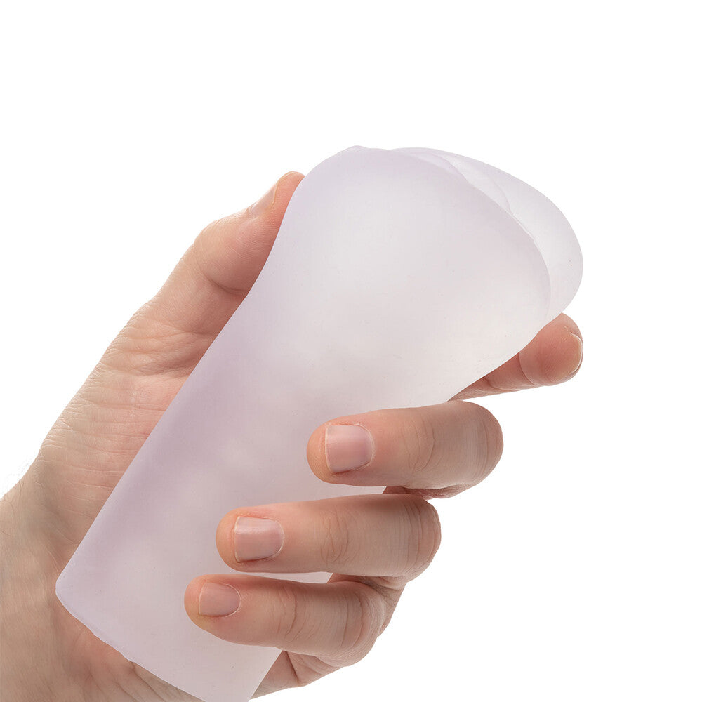 Clear, see-through California Exotic boundless vulva masturbator showing the internal texture and realistic shape.