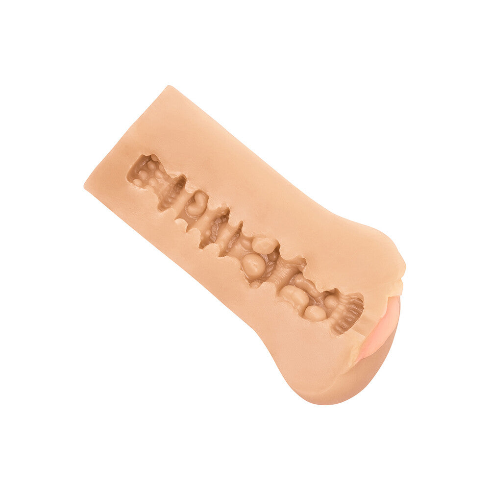Flesh pink vulva masturbator by california exotic, designed for solo pleasure using soft material.