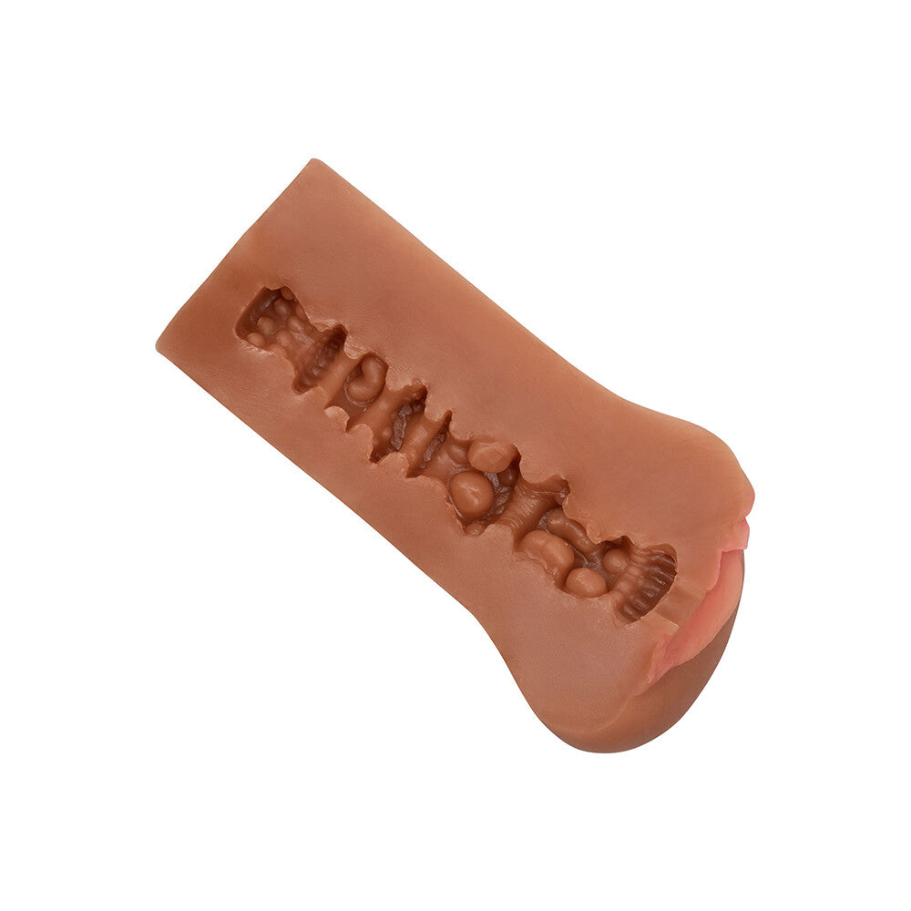 California Exotic boundless vulva masturbator in a flesh brown tone, designed for intimate pleasure.