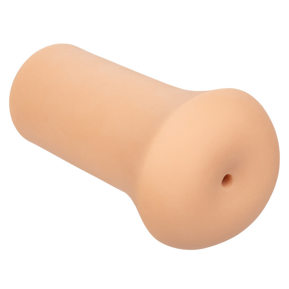 Flesh pink boundless stroker masturbator by california exotic, perfect for solo pleasure.