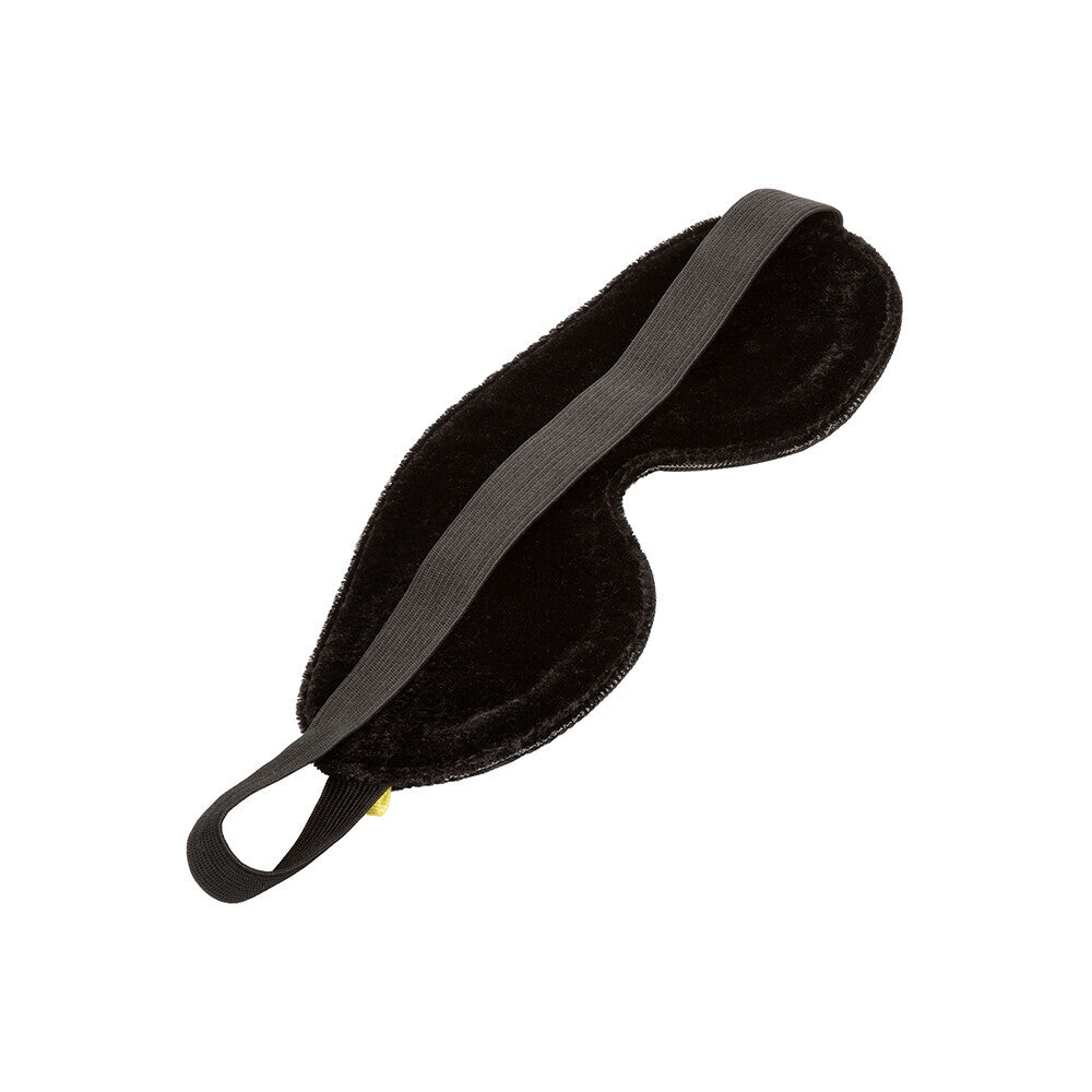 Close-up of a soft, black blackout eye mask for restful sleep and relaxation.