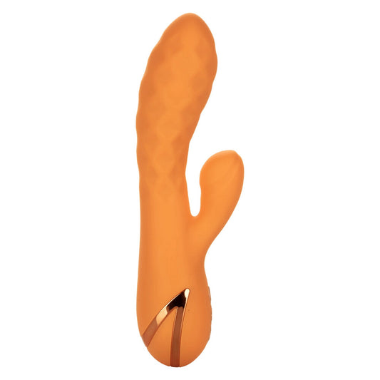 The Newport Beach Babe vibrator, a rechargeable clitoral stimulator in a smooth, flesh-toned finish.