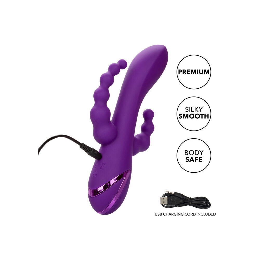 Close-up of a peachy-pink vibrator with clitoral stimulator, designed for external and internal pleasure.