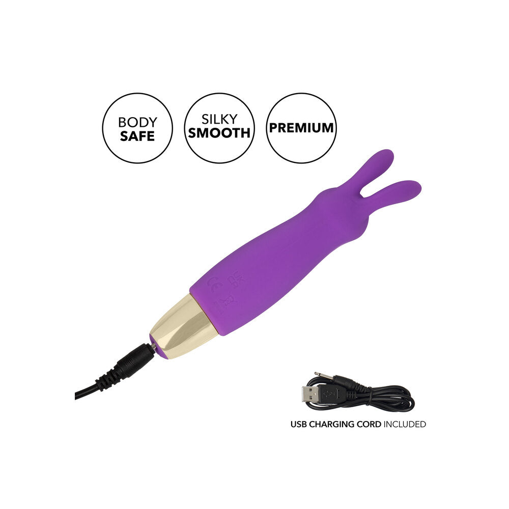 Teal mini rabbit vibrator with textured shaft for clitoral massage, a discreet pleasure toy.