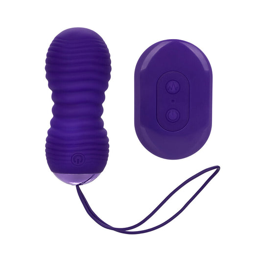 Ribbed bullet vibe with remote control, in a muted tone, for intimate pleasure.
