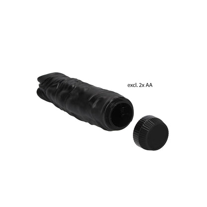 Black, realistic penis vibrator from Shots Toys, showcasing its smooth finish and lifelike design.