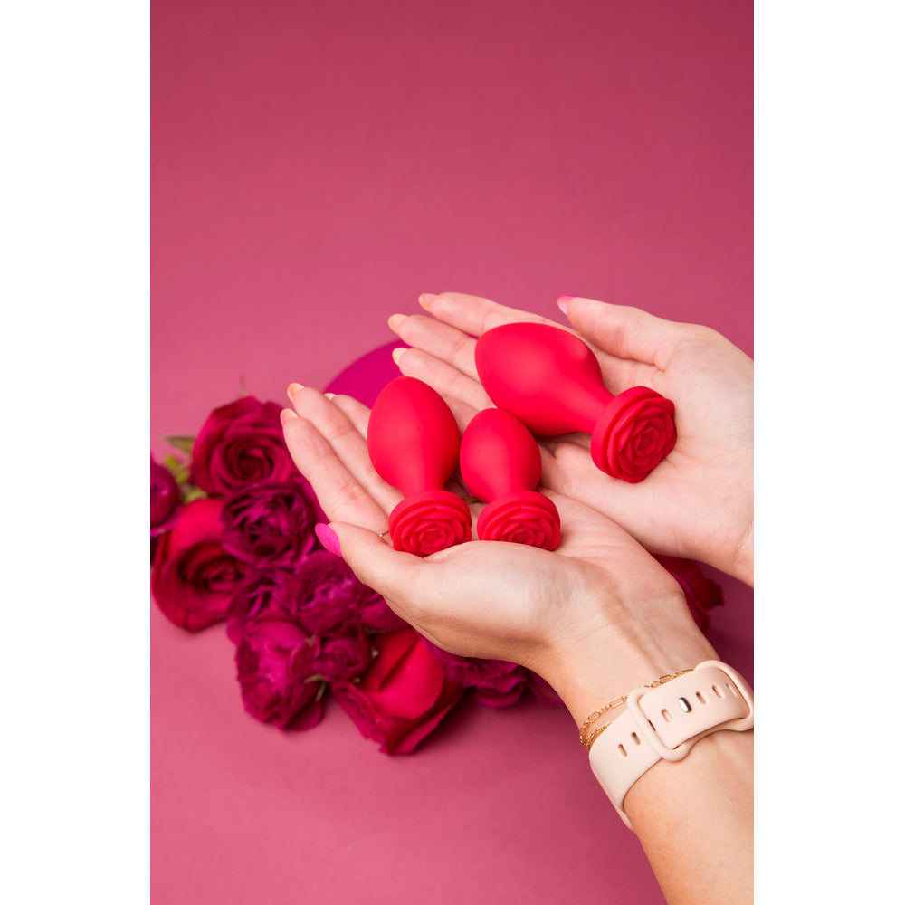 Secret Kisses rosegasm butt bouquet kit with three different sized plugs and accessories