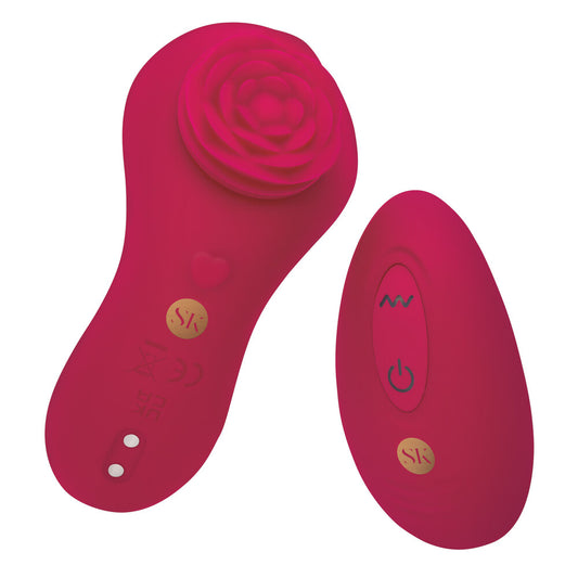 rose-shaped clitoral vibrator in pink silicone, a discreet and pleasurable personal massager.