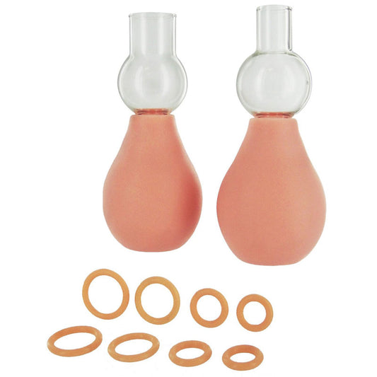 close-up on transparent plastic size matters nipple enlargement pumps for women