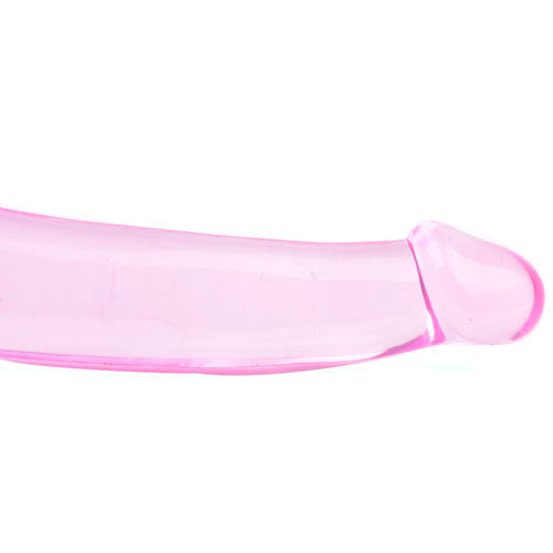 Double-ended pink strapless dildo for strap-on fun, showcasing smooth texture and versatile design.