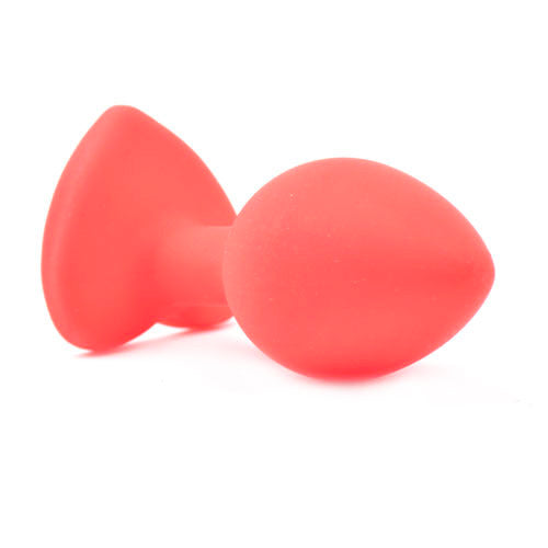 Red butt plug with a small heart-shaped diamond base, a cheeky little number.