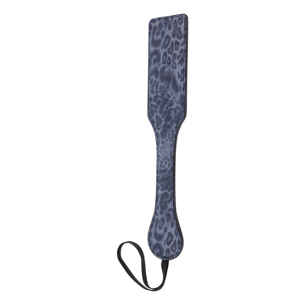 Cougar faux fur flogger with long black tails, perfect for playful sensual games.