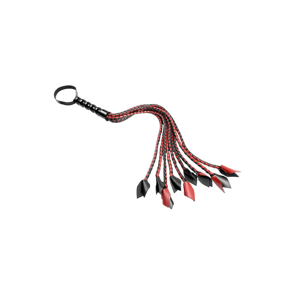 Saffron braided flogger whip with a textured handle, perfect for playful sensual experiences.