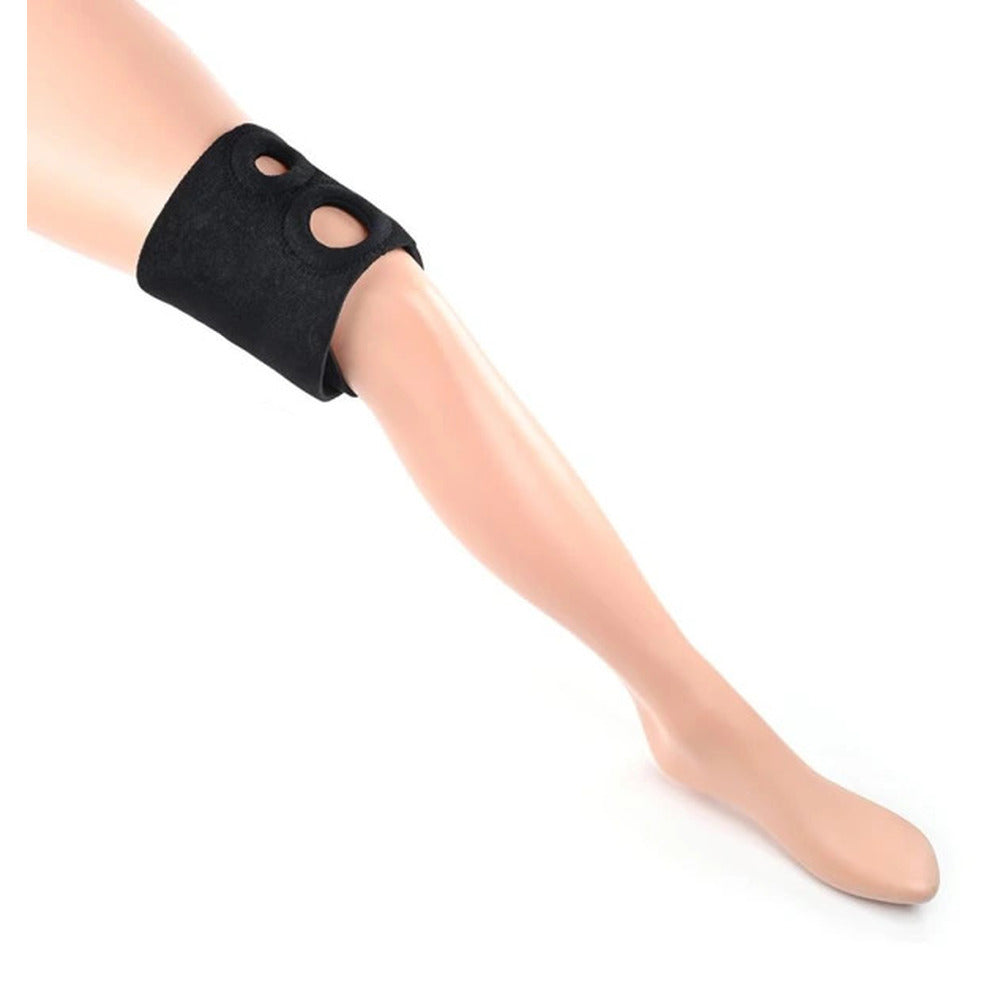 Sportsheets strap on harness for dual penetration play, worn on the thighs.
