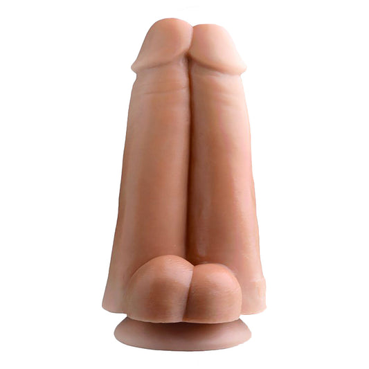 Realistic dual ended dildo in skin tone, featuring the Tom of Finland branding on the base.