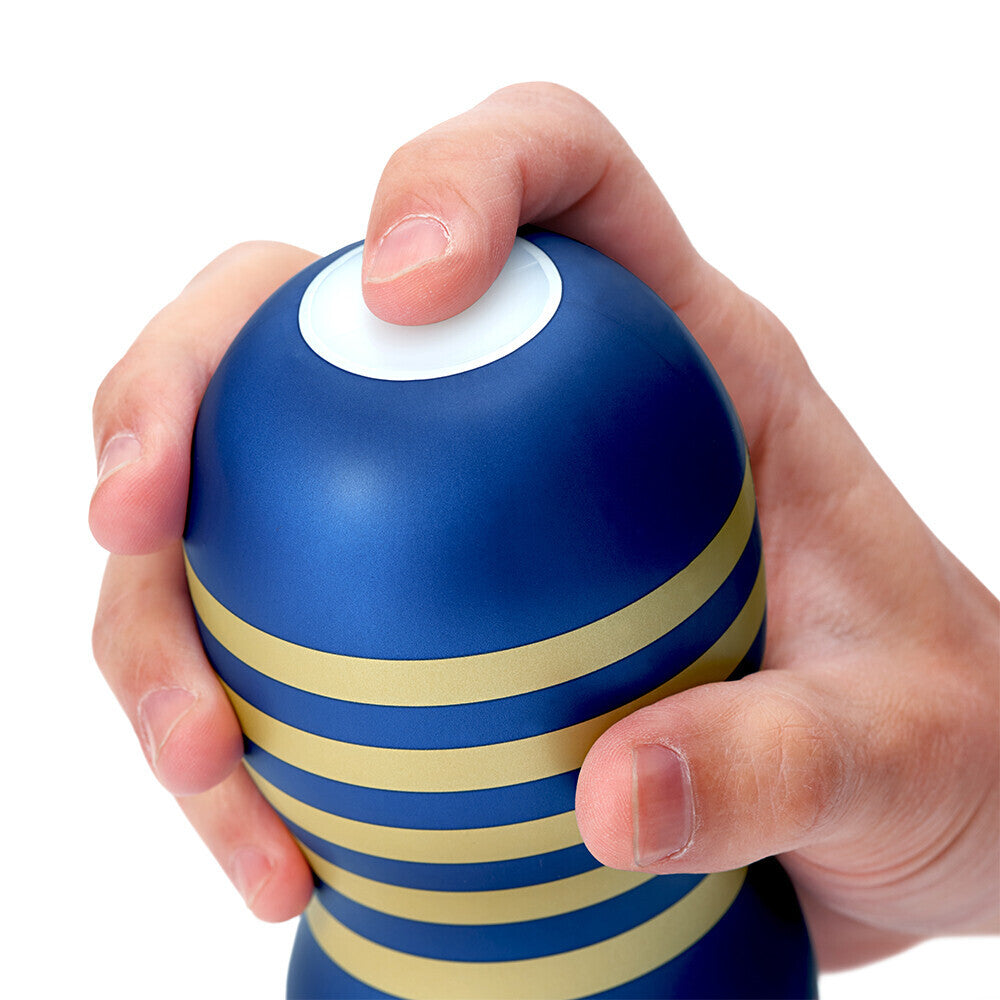 Tenga vacuum cup masturbator, premium original design, flesh-toned silicone material, textured interior for personal pleasure.