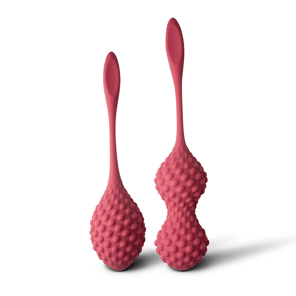 rocks off unite silicone kegel set, graduated sizes in pink and purple with smooth finish for exercise