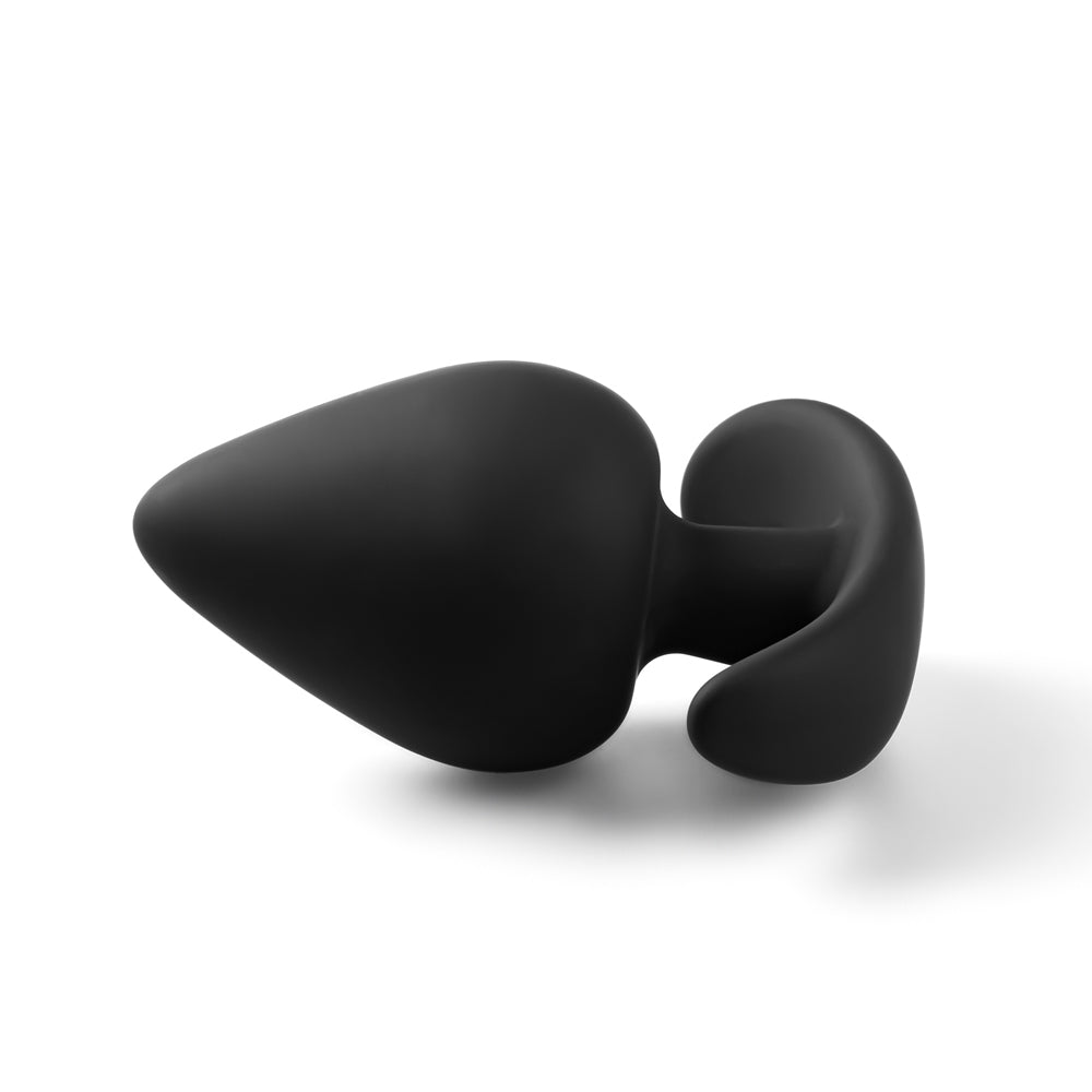 A set of small sized, smooth, silicone butt plugs for anal play, various colours.