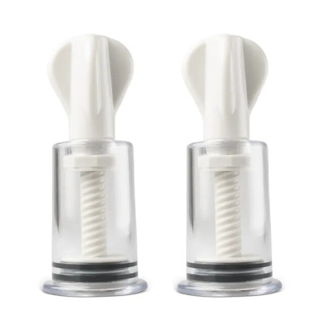 Clear plastic nipple suckers with adjustable pump, a fun female pump toy from various brands.