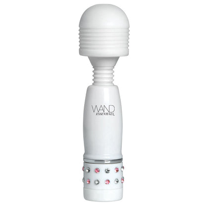 Close-up of a small, lilac massage wand with a smooth, rounded head for focused use.