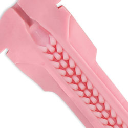 Fleshlight Vibro Pink Lady Touch masturbator, flesh-toned, with textured interior for a stimulating experience.