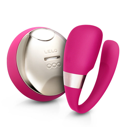 Cerise-coloured Lelo Tiani 3 rechargeable couple's massager with a smooth, luxurious finish, ideal for intimate pleasure.