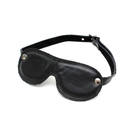 Soft, cushioned blindfold in a neutral colour, perfect for blocking out light for restful sleep.
