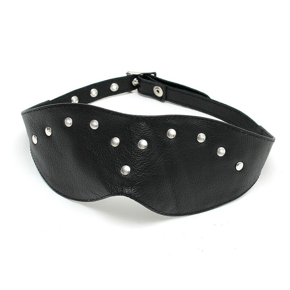 Close-up of a Rimba leather blindfold mask, showing the soft black material and stitching.