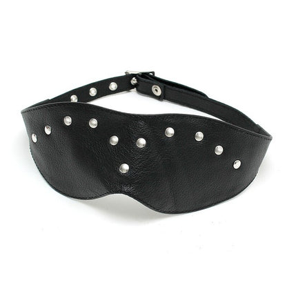 Close-up of a Rimba leather blindfold mask, showing the soft black material and stitching.