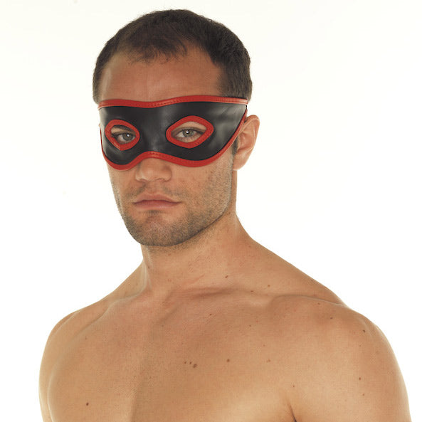 Rimba red and black leather mask with a sleek, eye-catching design for parties.