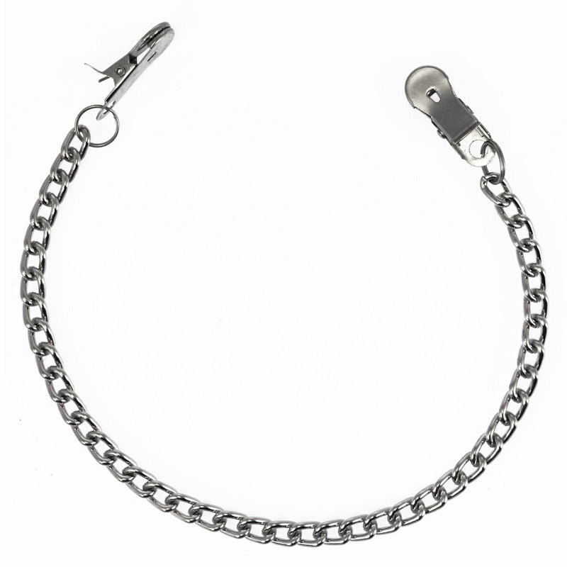 A pair of large Rimba nipple clamps, made from silver-coloured metal, designed for adult use.