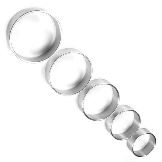 Close-up of a slim, silver-tone metal cock ring, 1.5 inches wide, for intimate bondage play.