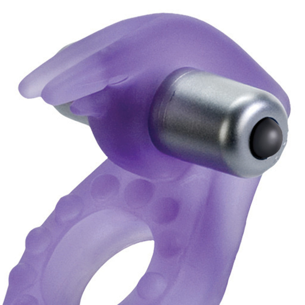 Close-up on a purple, flexible silicone vibrating cockring shaped like a rabbit for added pleasure.