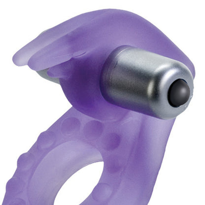 Close-up on a purple, flexible silicone vibrating cockring shaped like a rabbit for added pleasure.