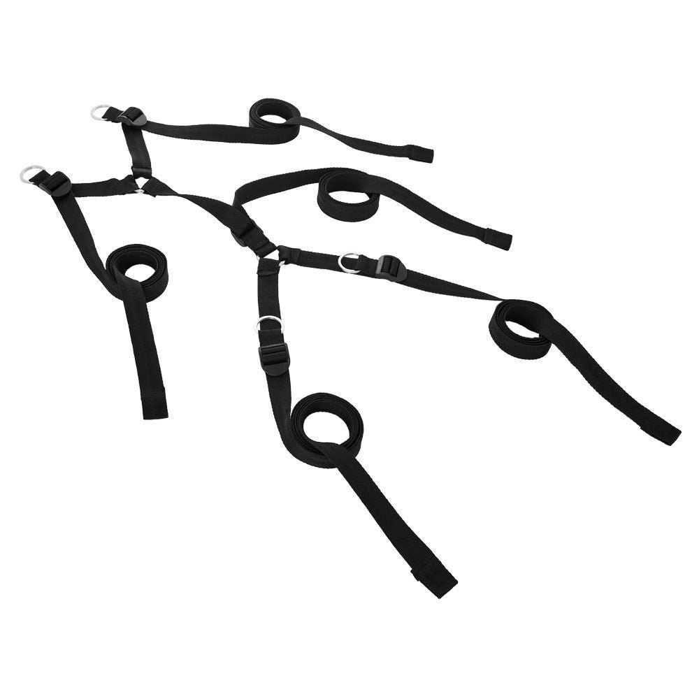 Sportsheets under bed restraint system, black straps and metal fixings for playful bondage.
