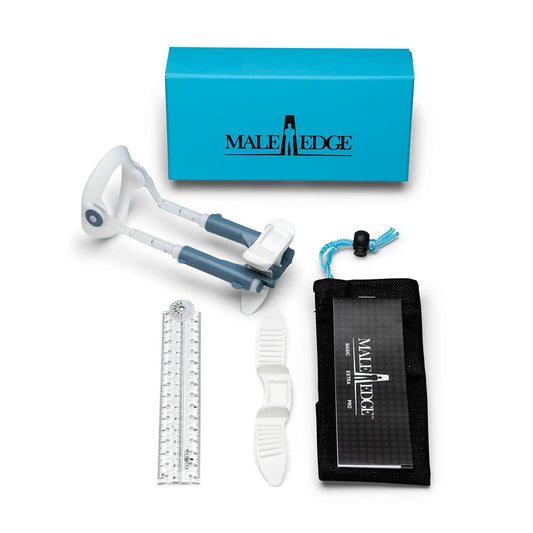 The Male Edge penis developer, a medical device, showing the extender and accessories.